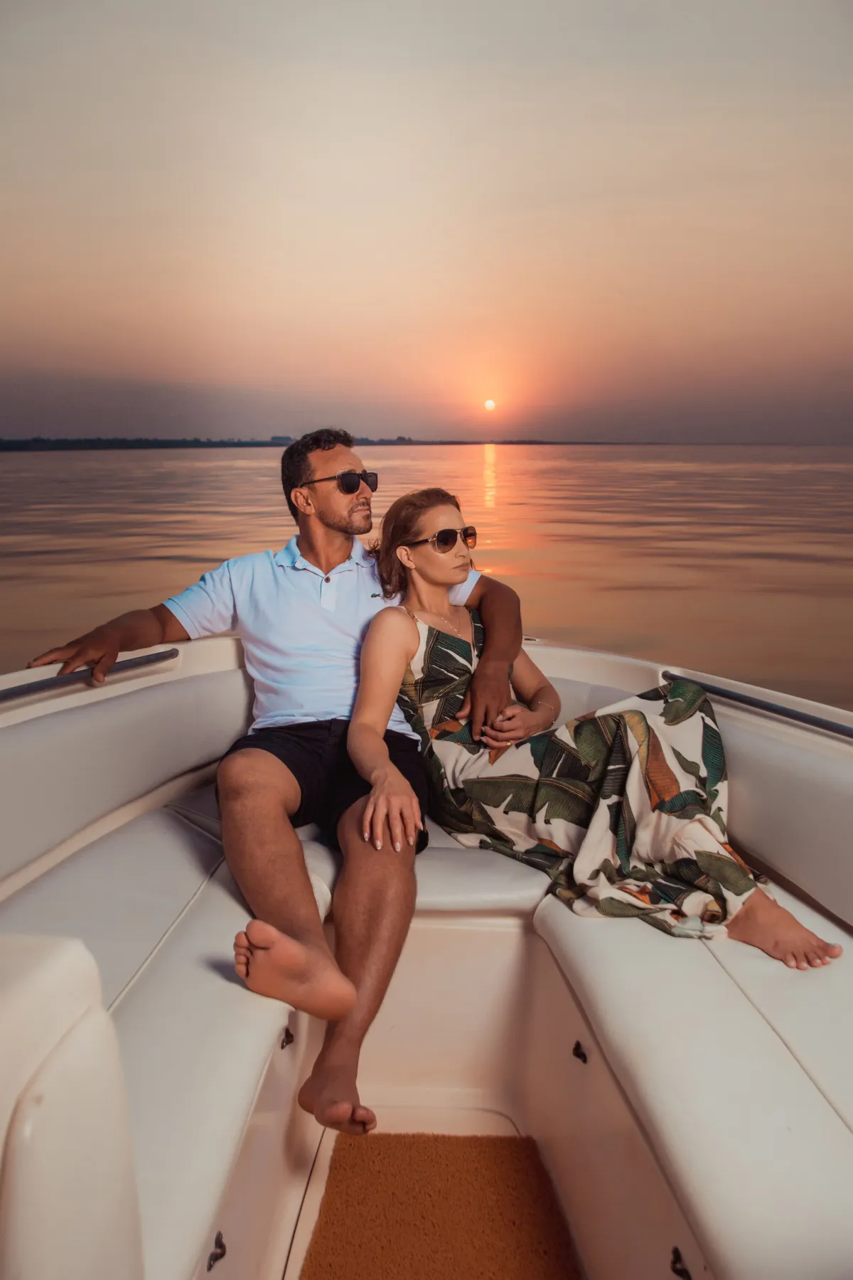 Couple enjoying a sunset boat trip in Croatia