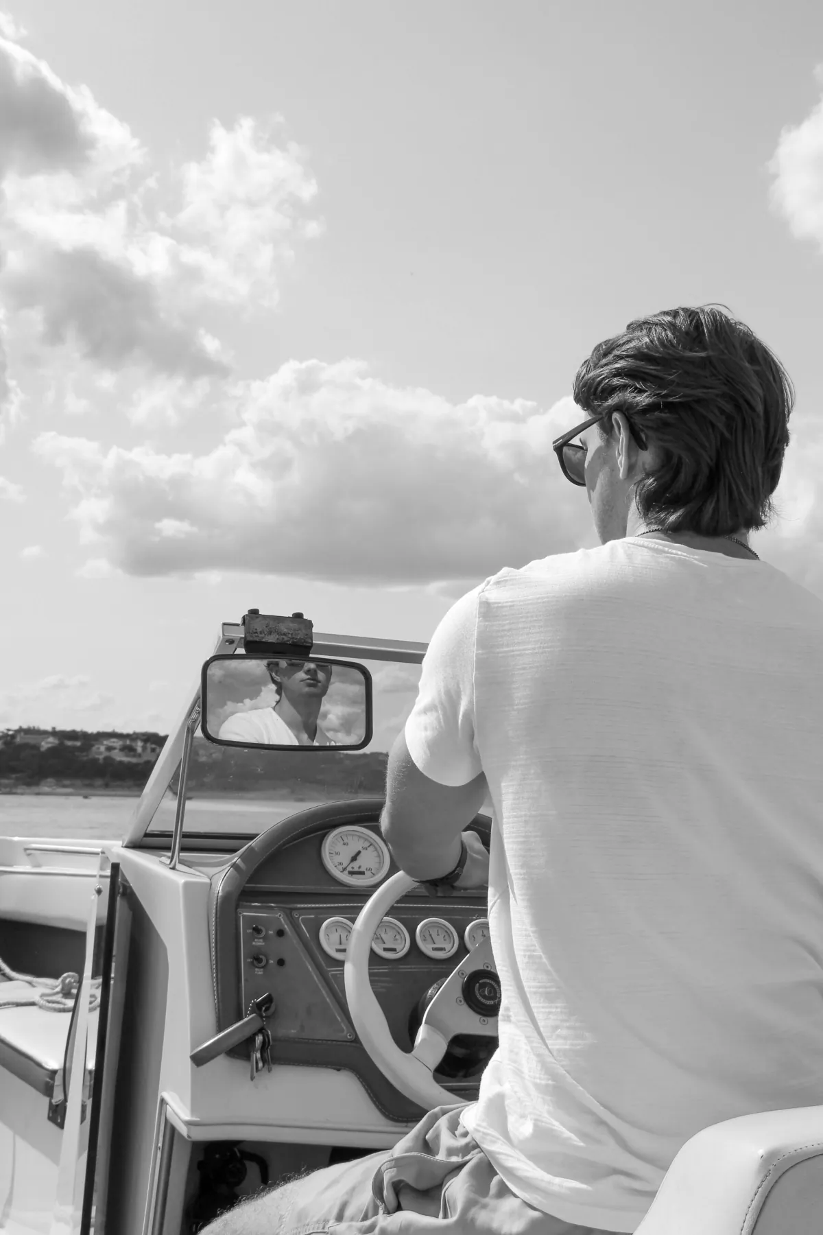 Skipper at the helm during a boat route