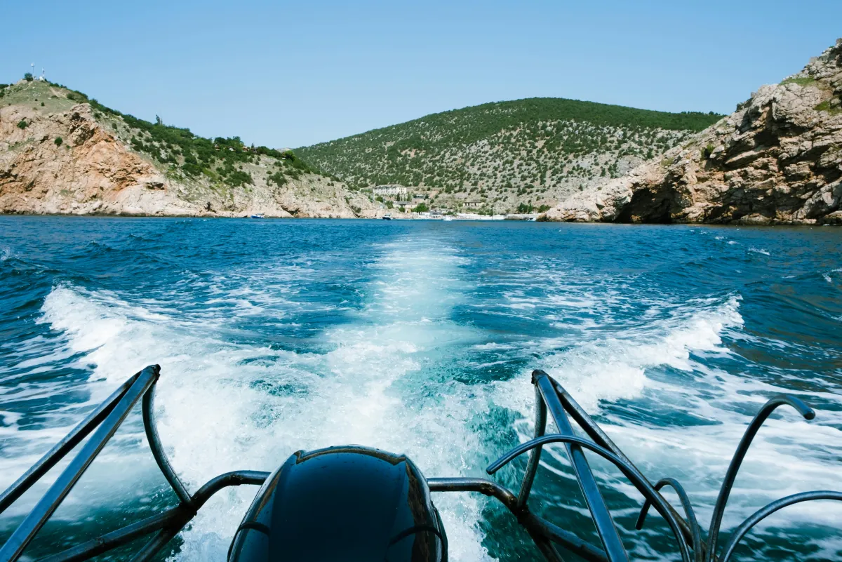 Rocky Mediterranean coastline and clear sea for boat routes